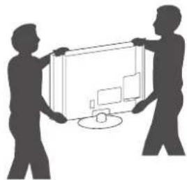 Silhouette of two people holding a large rectangular device with a computer monitor nearby (no text or symbols)