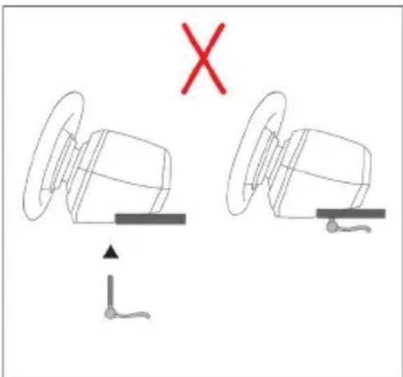 Diagram showing two mechanical components with a red 'X' mark and directional arrows, possibly indicating a failure or comparison.