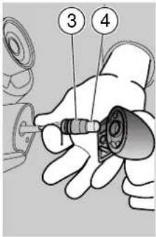 Diagram showing a hand holding a mechanical component with numbered parts labeled 3 and 4