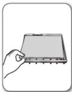 Hand holding a rectangular electronic component (no visible text or symbols).