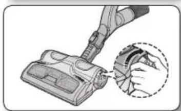 Illustration of a hand holding a vacuum cleaner with a magnified inset showing the component detail (no text or symbols present).