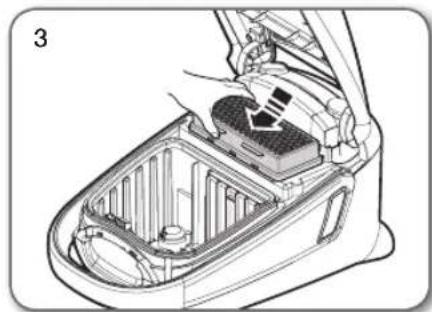 Technical illustration of a car interior showing internal components and a hand inserting a component.