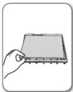 Hand holding a rectangular electronic component with pins.