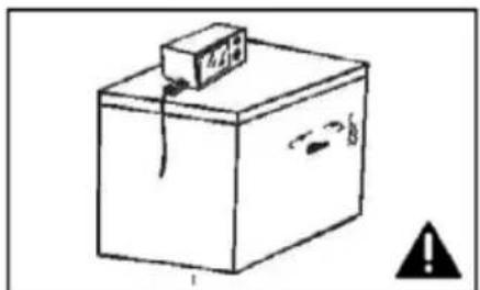 Diagram of a box with a labeled container and warning symbol, likely for safety or hazard detection.