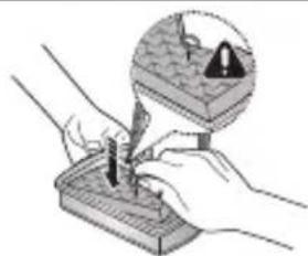 Illustration of hands using a tool to apply a component, with an inset showing a warning symbol (no text or labels present)