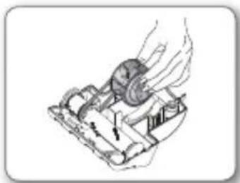 Diagram of a mechanical device with a hand operating it, showing internal components and motion arrows (no text or symbols).