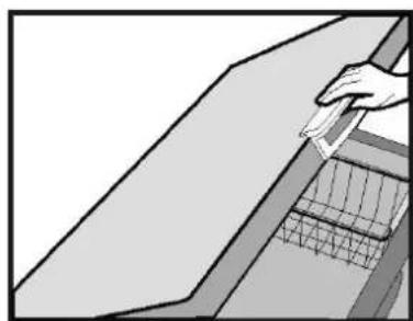 Illustration of a hand cleaning a wall with a basket and grid (no text or symbols)