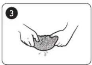 Illustration of two hands holding a textured, granular object (no text or symbols).