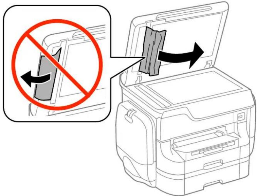 Diagram illustrating a printer's internal structure with prohibition symbol and directional arrows indicating movement or removal.