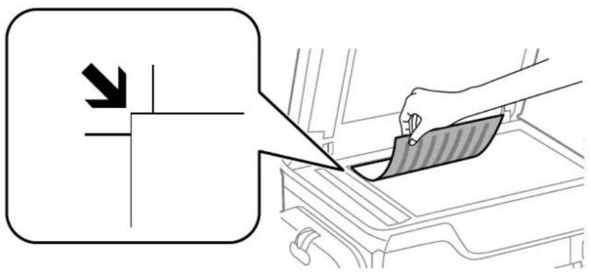 Diagram showing a hand using a tool to clean or remove a vehicle's exhaust, with an arrow indicating the direction of change.
