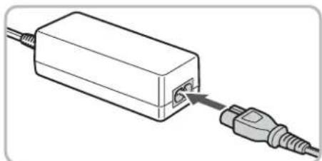 CANON IXUS 990 IS - Plug the cord into the coupler. - 1