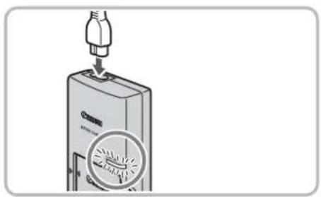 CANON IXUS 990 IS - Charge the battery. - 1