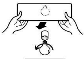 Diagram showing two hands holding a rectangular object with a snowflake, and a snowman figure below indicating the process.