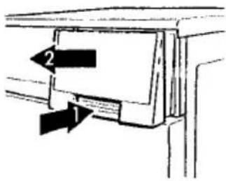 Diagram showing a device with labeled components and directional arrows, likely illustrating a mechanical or electrical component.