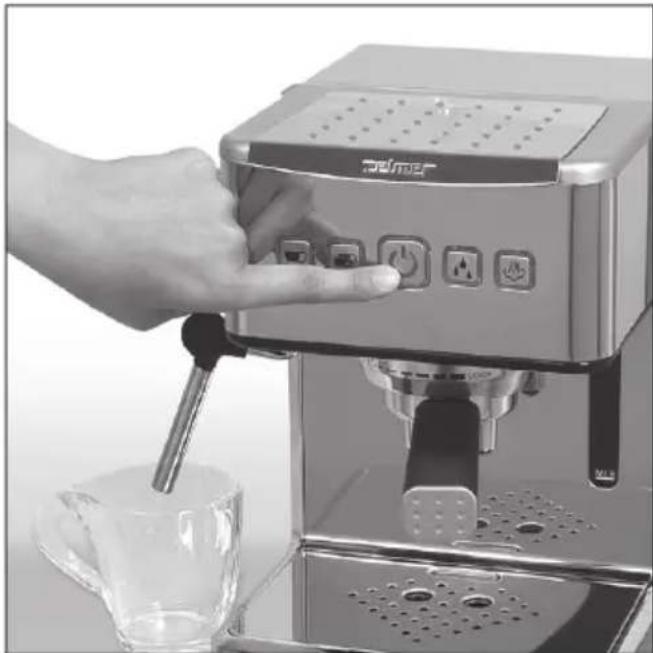 Close-up of a hand using a Elmer espresso machine to press or<|rotate_right|> from a glass cup (no visible text or symbols)