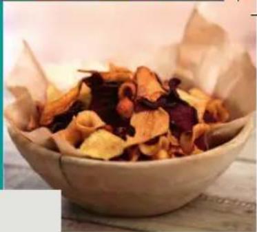 Bowl of dried, sliced dried plant material on a wooden surface (no text or symbols visible)
