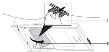 Diagram showing a hand holding a windmill with labeled parts, including a magnified view of the device's internal structure.