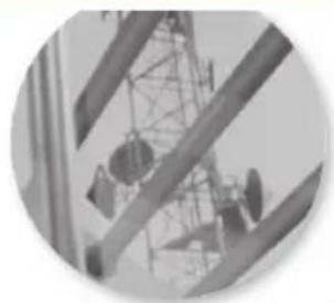 Close-up of a steel truss structure with overhead cranes and cables (no visible text or symbols)