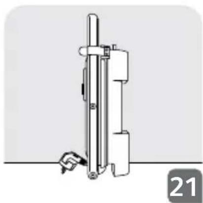Diagram of a vertical mechanical device with a handle and base, no visible text or symbols