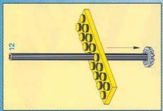 Diagram of a mechanical assembly with a yellow component and rotating shaft (no text or symbols)