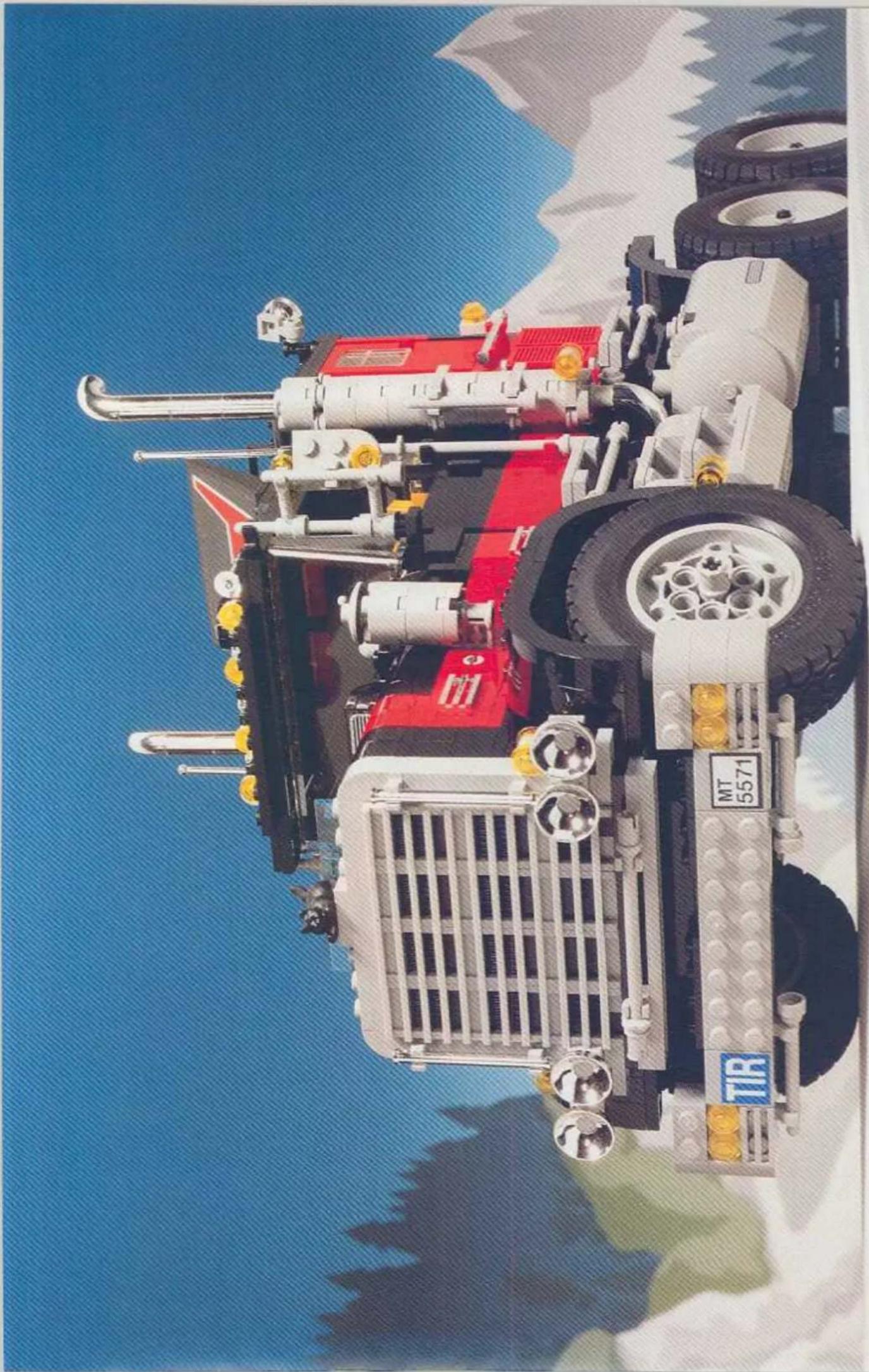 Top-down view of a LEGO car with red and white components against a blue sky background (no visible text or symbols)