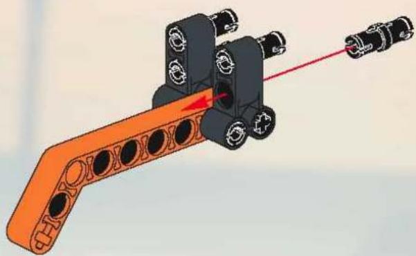 3D mechanical assembly diagram showing a lever mechanism with orange frame and black components, no text or symbols present