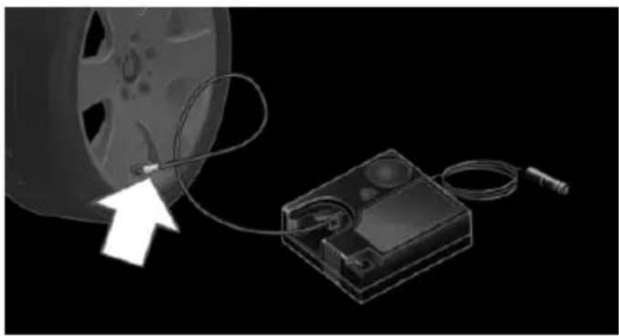Illustration of a film reel connected to an electronic device with cable, no text or symbols present