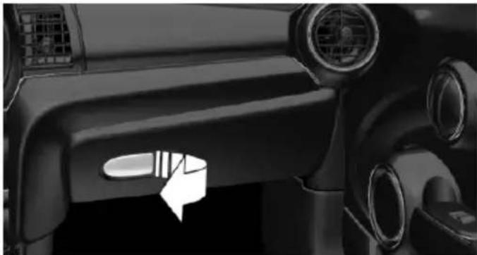 Interior view of a car dashboard with air vent and directional arrow (no text or symbols)
