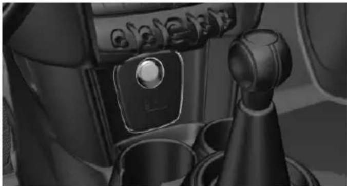Interior view of a car gear shift lever and dashboard (no visible text or symbols)