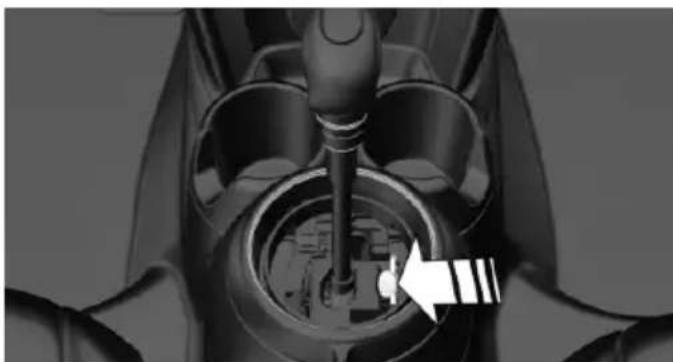 Close-up of a mechanical component with a circular dial and internal structure, no visible text or symbols
