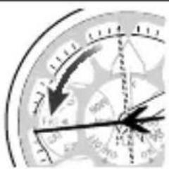 Close-up of a circular gauge or dial with directional arrows and measurement markings, showing values like 1.00, 0.75, 0.50, and 0.25.