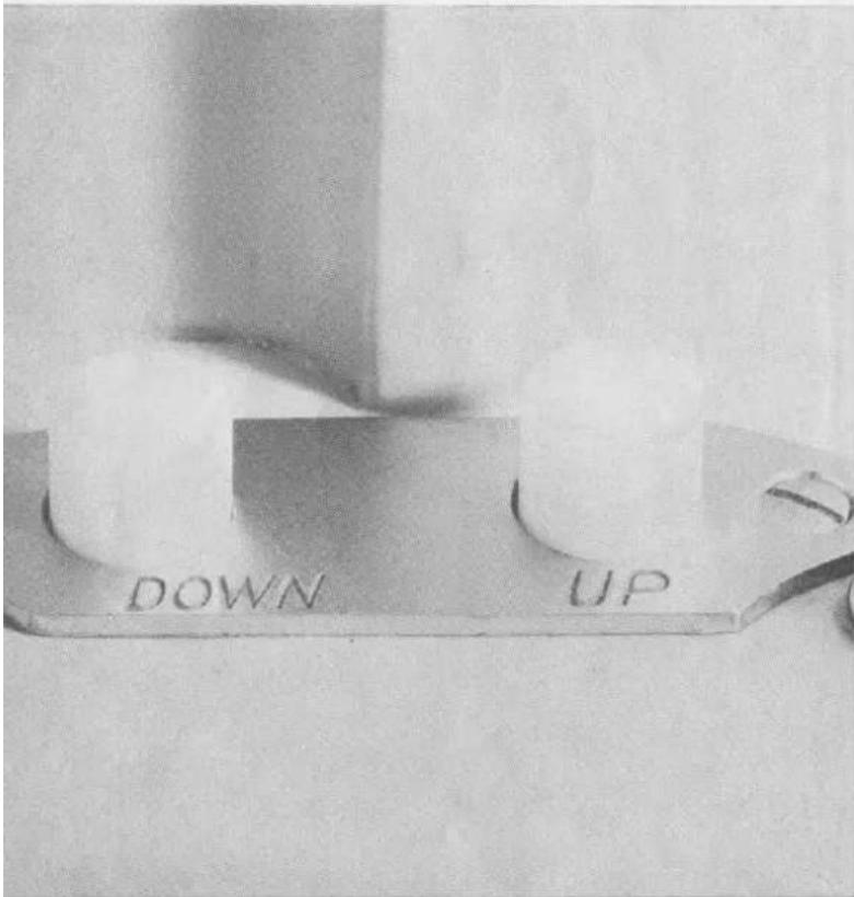 DOWN UP