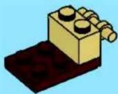 Illustration of a LEGO brick with four circular components on top, mounted on a dark base (no text or symbols)