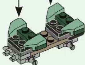 Diagram of two stacked mechanical components with green and brown parts, no text or symbols present