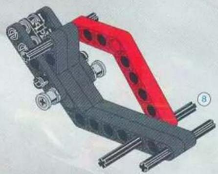3D mechanical assembly diagram showing a red and black structural component with bolts and mounting holes (no text or symbols)