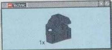 3D rendered object resembling a house or mechanical part with a 1x label, displayed within a window frame (no readable text or symbols on the object itself)