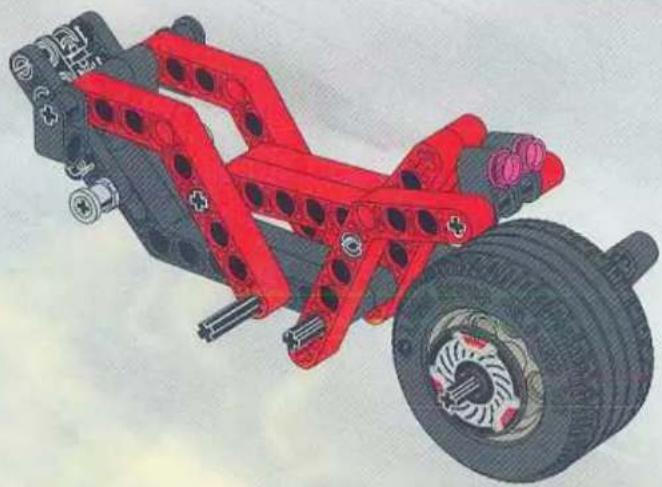3D rendered model of a vehicle chassis with red structural components and wheels (no text or symbols visible)