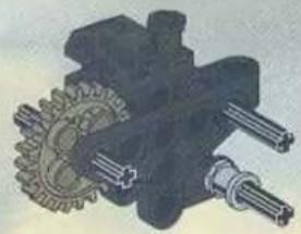Mechanical gear assembly diagram showing gears and shafts (no text or labels)