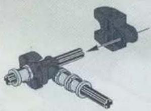 Mechanical assembly diagram showing two shafts with threaded ends and a housing (no text or symbols)