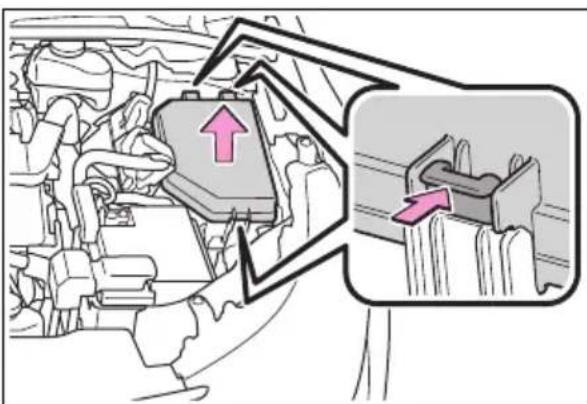 Diagram showing engine compartment with highlighted valve and directional arrows, likely illustrating a mechanical or electrical system component.