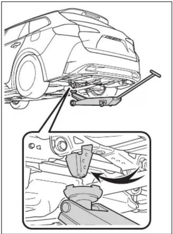 Technical diagram showing car suspension system with mechanical components and structural change, including a close-up of the assembly.