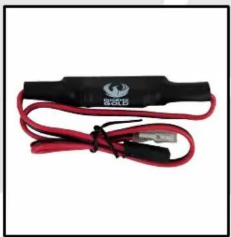 Close-up of a black and red electrical clamp with a small connector (no visible text or symbols)