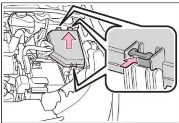 Diagram showing engine compartment with highlighted valve and directional arrows, likely illustrating a mechanical or electrical system component.