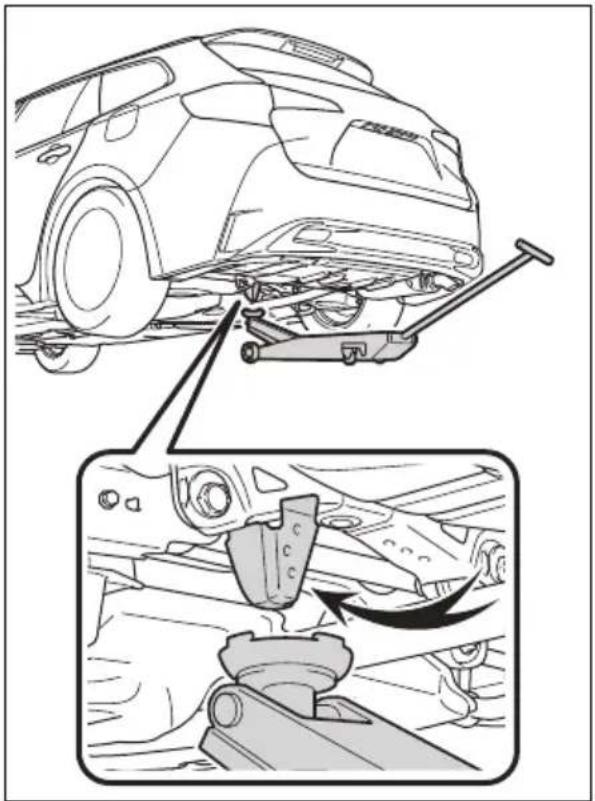 Technical diagram showing car suspension system with mechanical components and structural change, including a close-up of the assembly.