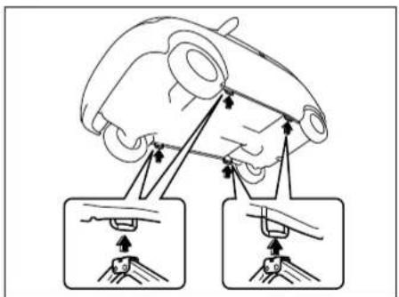 Diagram illustrating a robotic arm with force application and manual grip, showing two different positions of the arm.