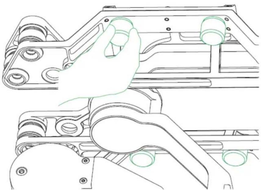 Technical line drawing of a hand operating a mechanical component with no visible text or symbols