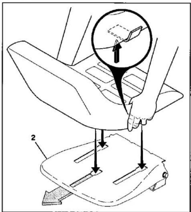 Technical diagram showing a hand operating a car seat with directional arrows and a magnified inset highlighting a specific component.