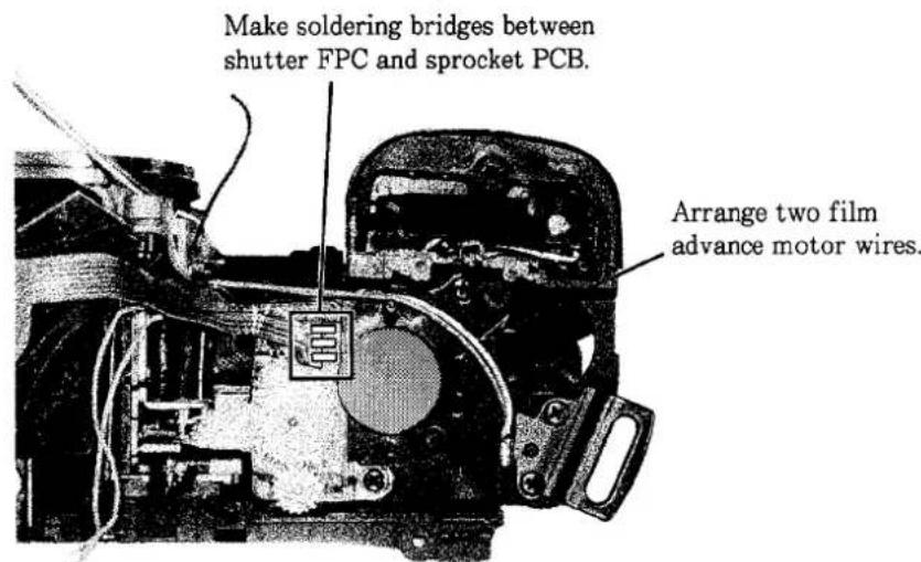 Make soldering bridges between shutter FPC and sprocket PCB. Arrange two film advance motor wires.