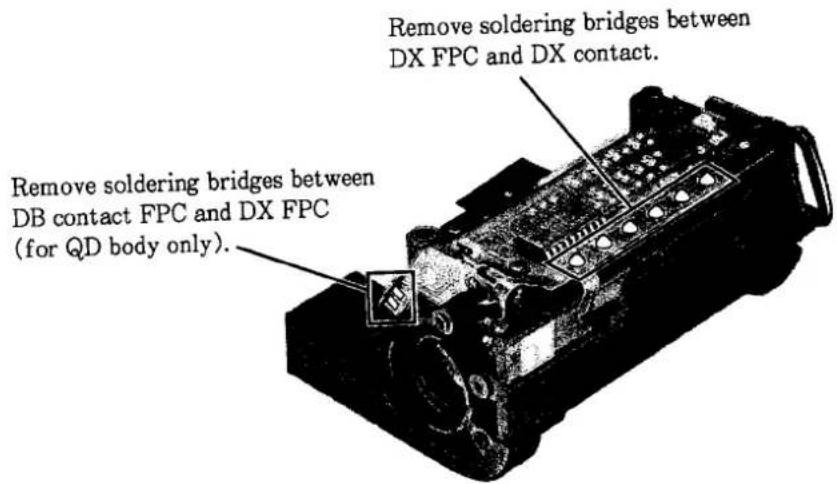 Remove soldering bridges between DX FPC and DX contact. Remove soldering bridges between DB contact FPC and DX FPC (for QD body only).