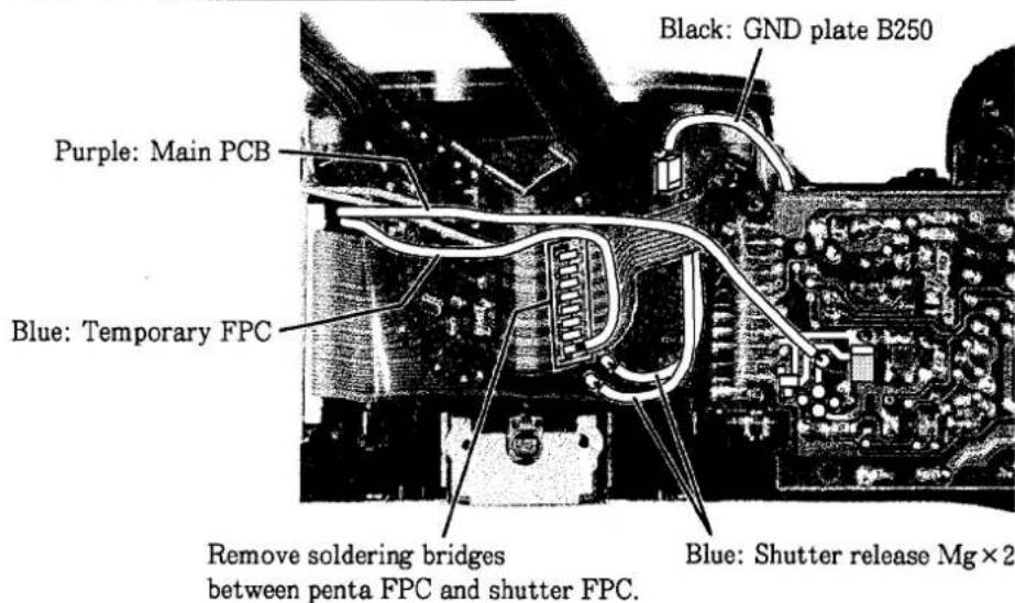Black: GND plate B250 Purple: Main PCB Blue: Temporary FPC Remove soldering bridges between penta FPC and shutter FPC. Blue: Shutter release Mg×2